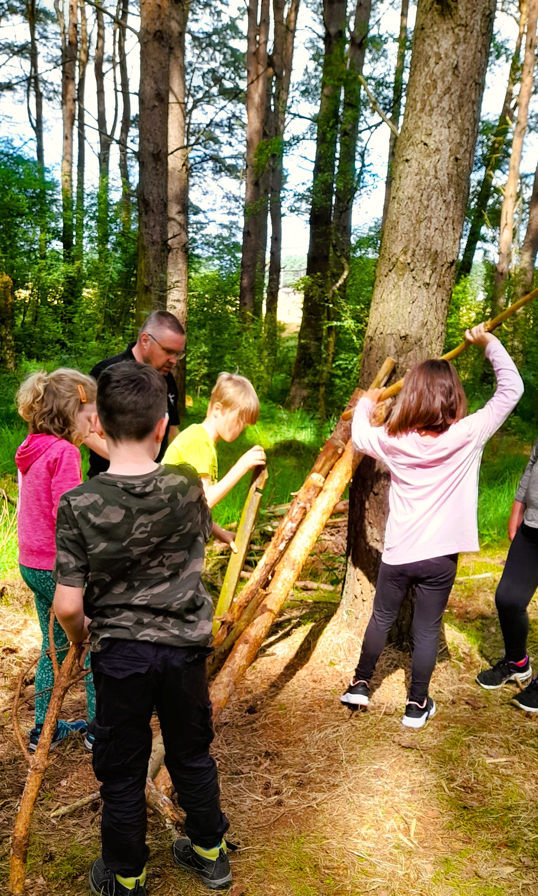 Children shelter building in the woodland