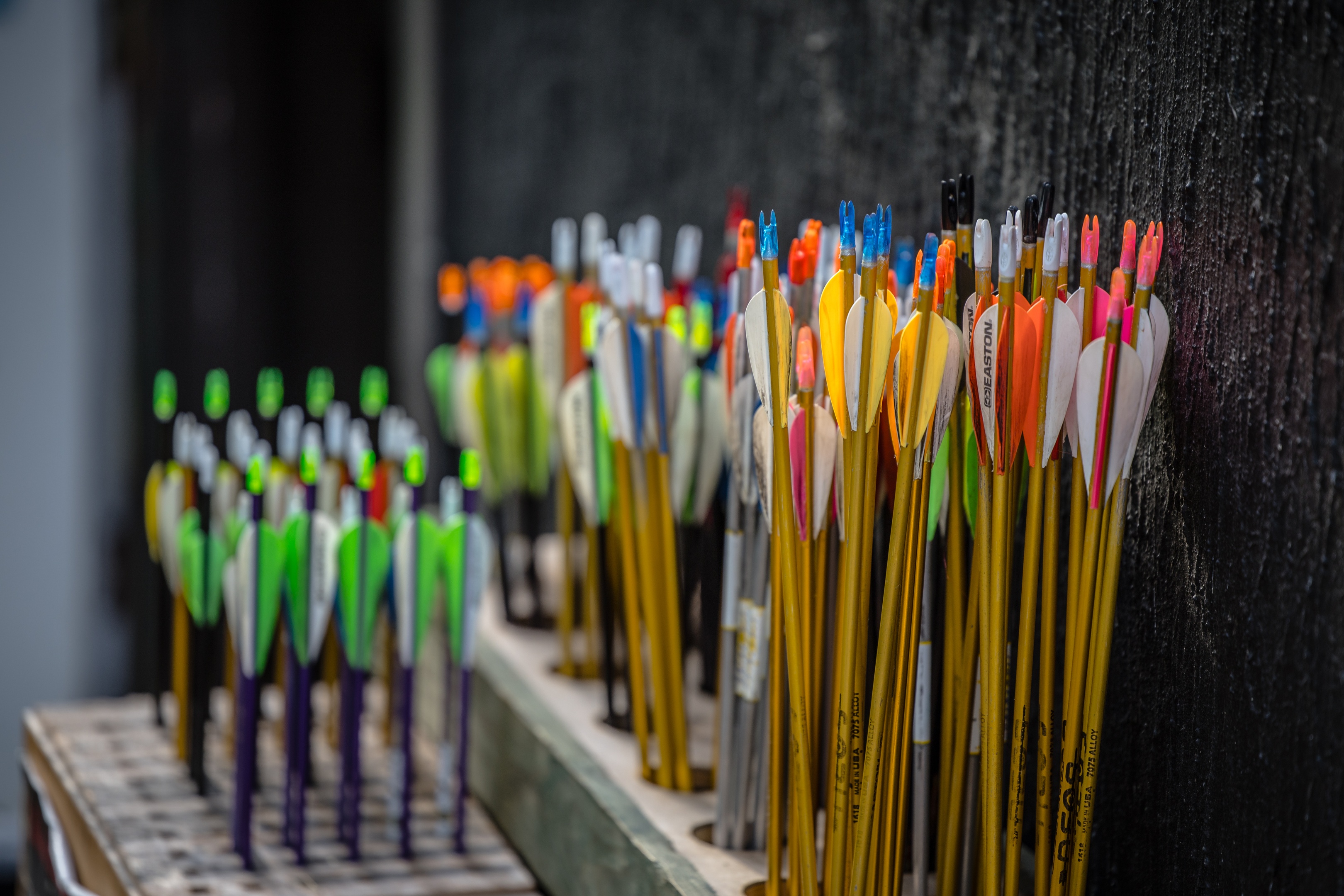 lots of colourful arrows in an arrow holder