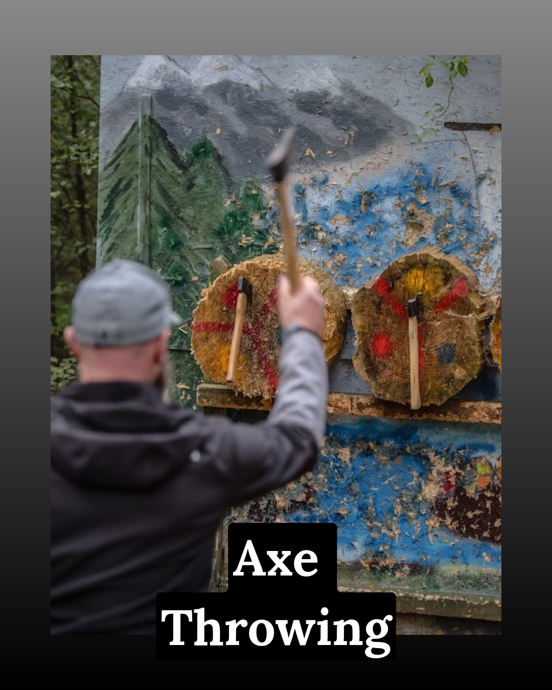 Man throwing Axes in the axe throwing zone