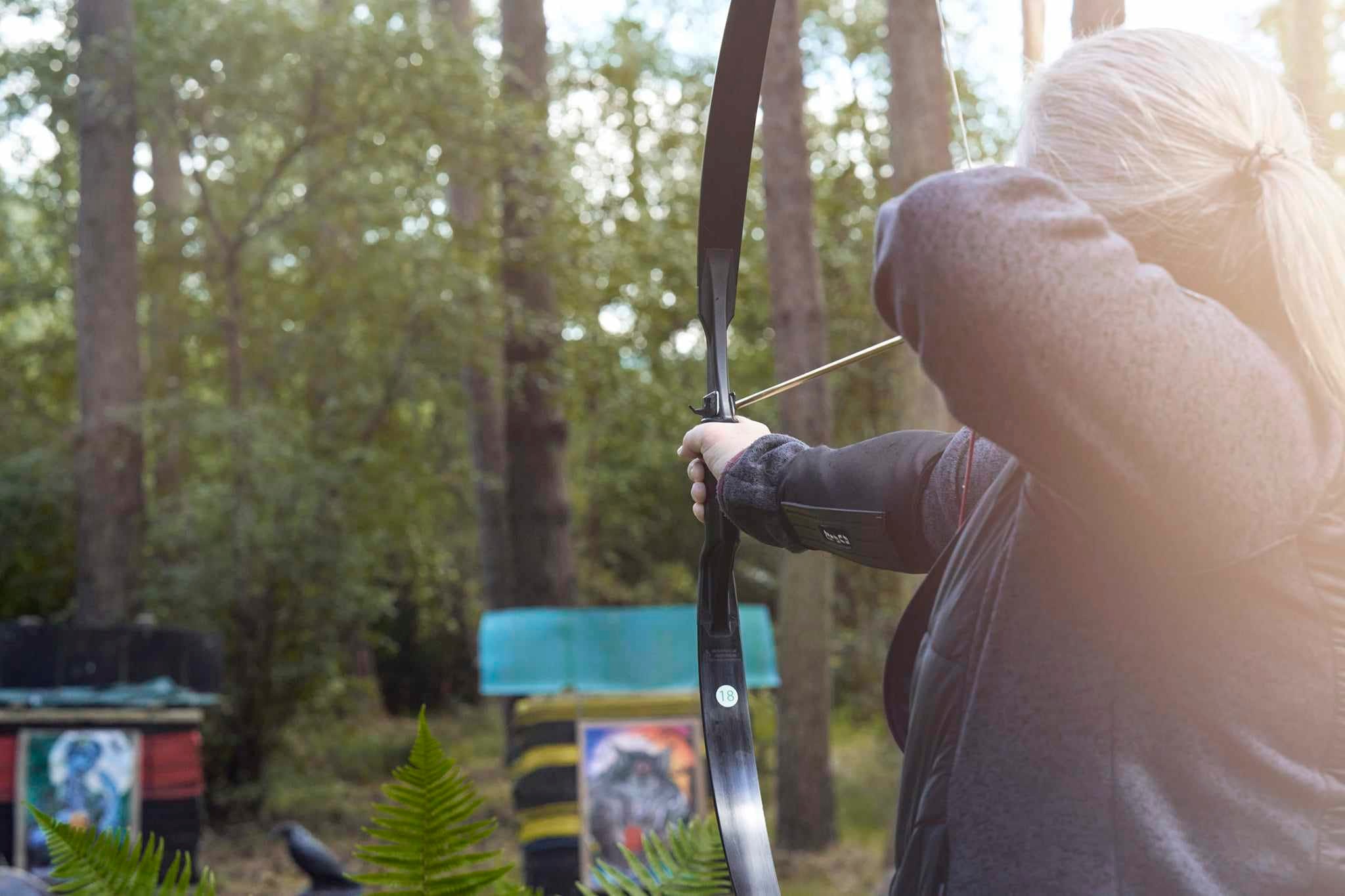 person doing archery at the graveyard zone