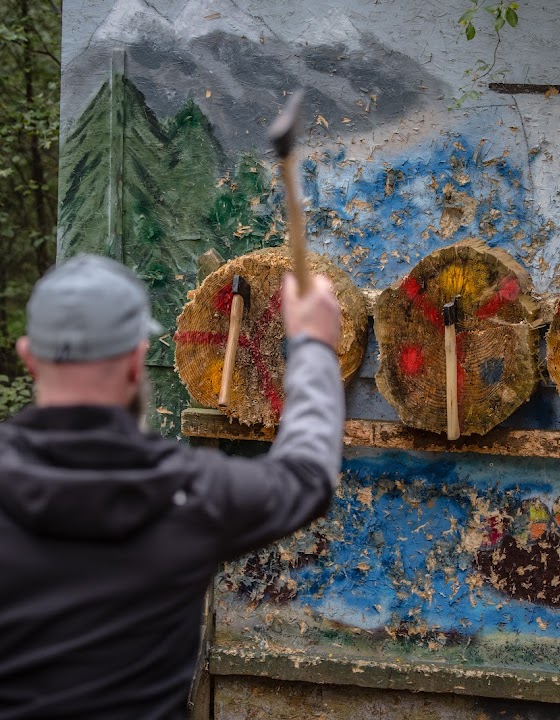 man throwing axe 