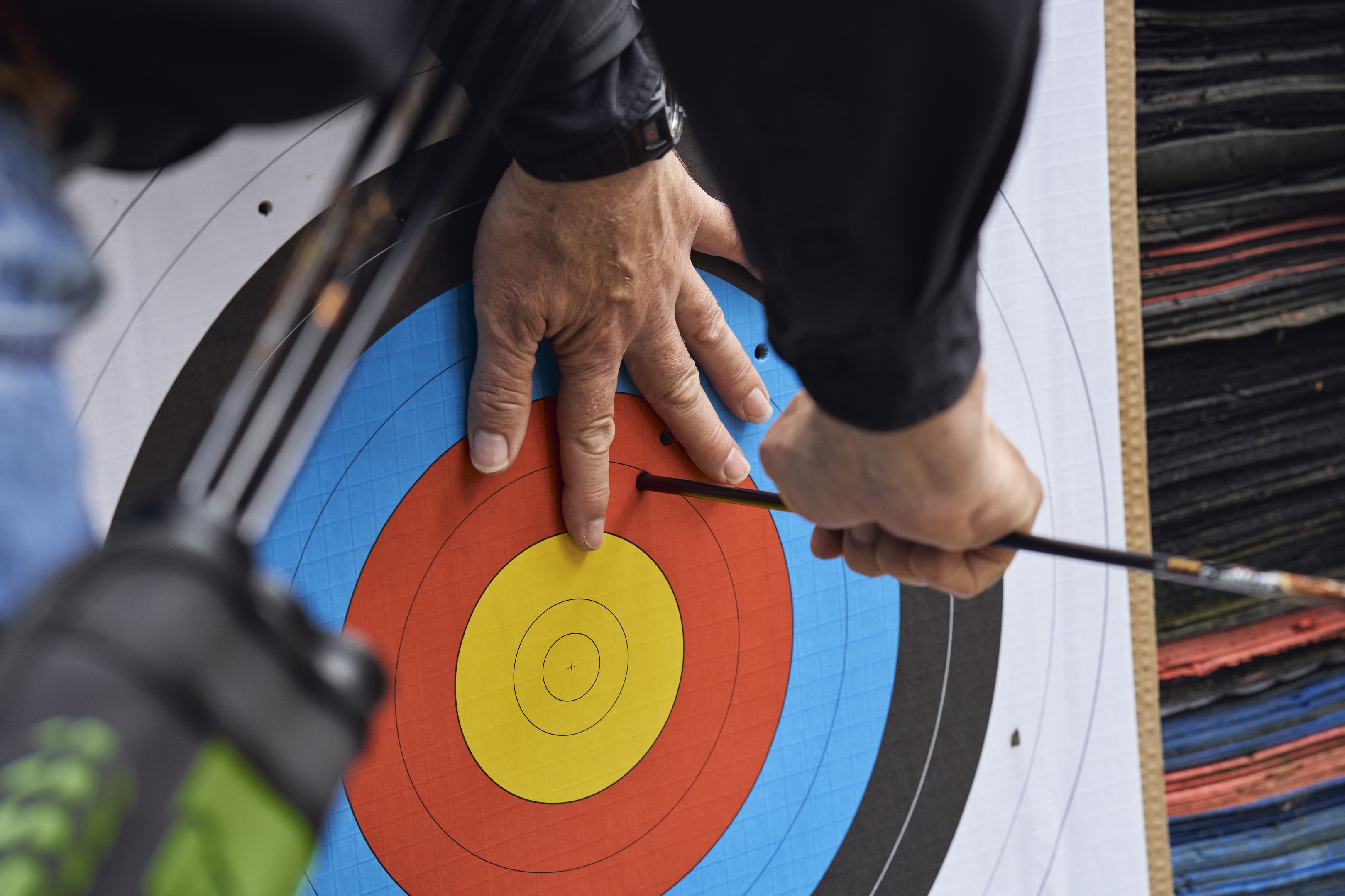 Family participating in the fun combat archery game